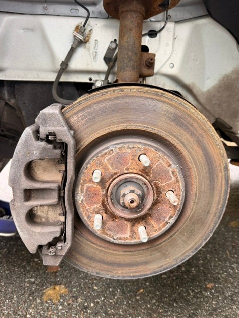 Severely rusted brake rotor and hub assembly